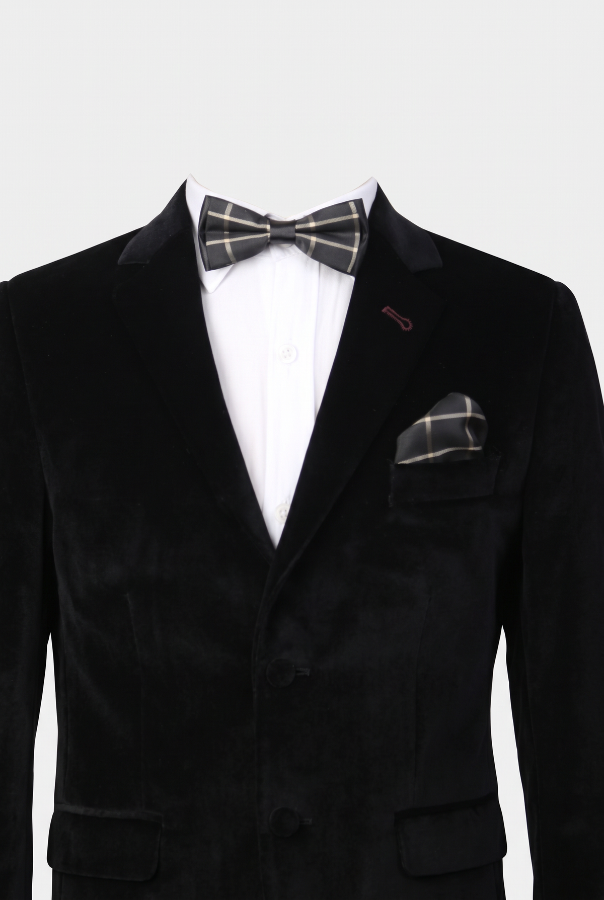 Boys checkered bow tie and matching pocket square styled with a formal suit in black and gold