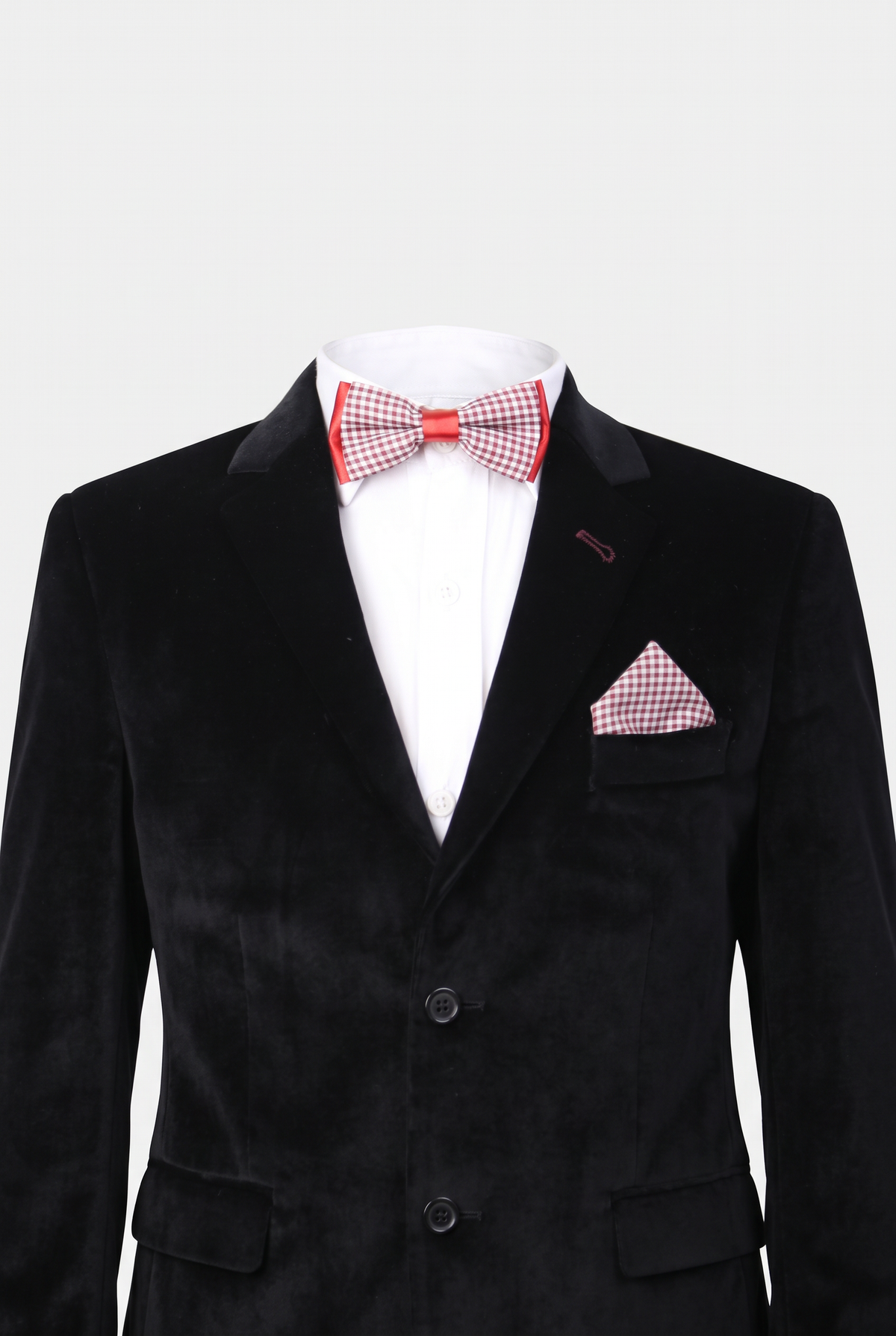 Boys checkered bow tie and matching pocket square styled with a formal suit in burgundy and grey