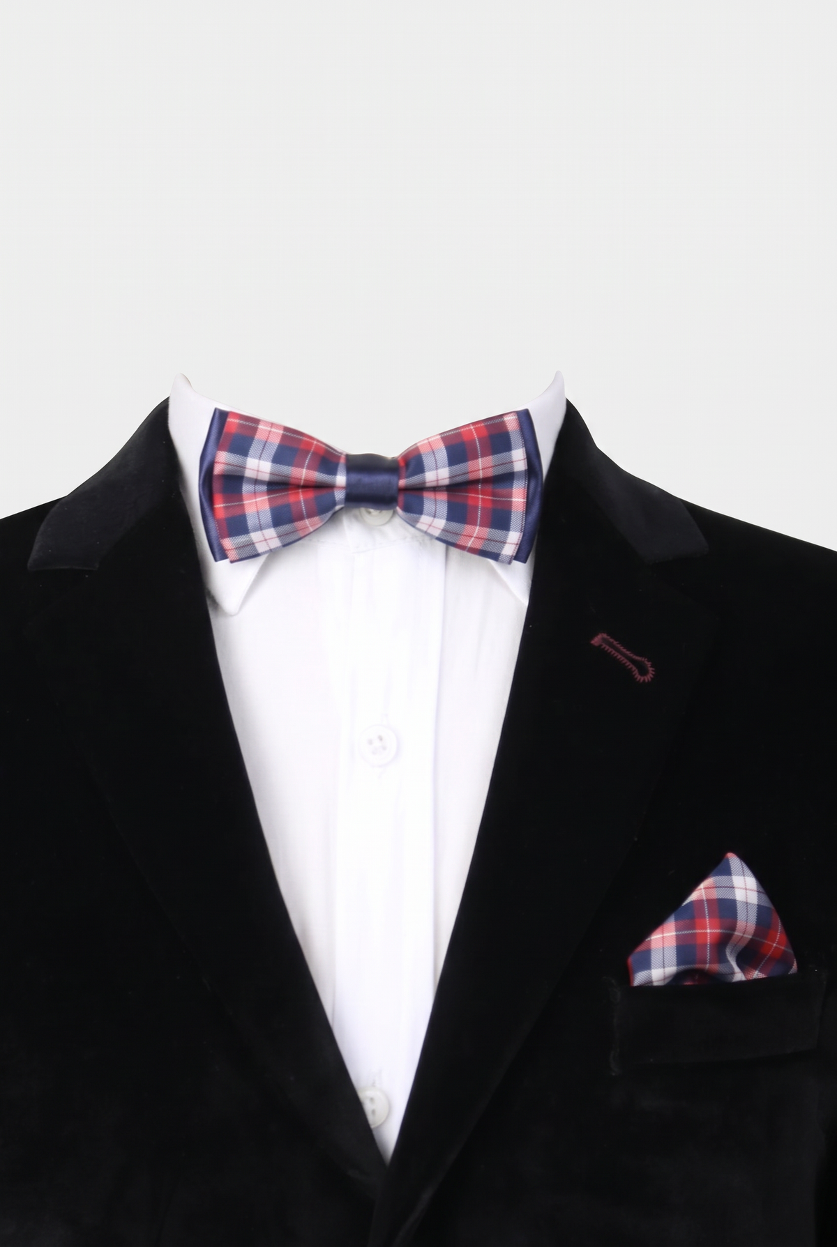 Boys checkered bow tie and matching pocket square styled with a formal suit in red and navy
