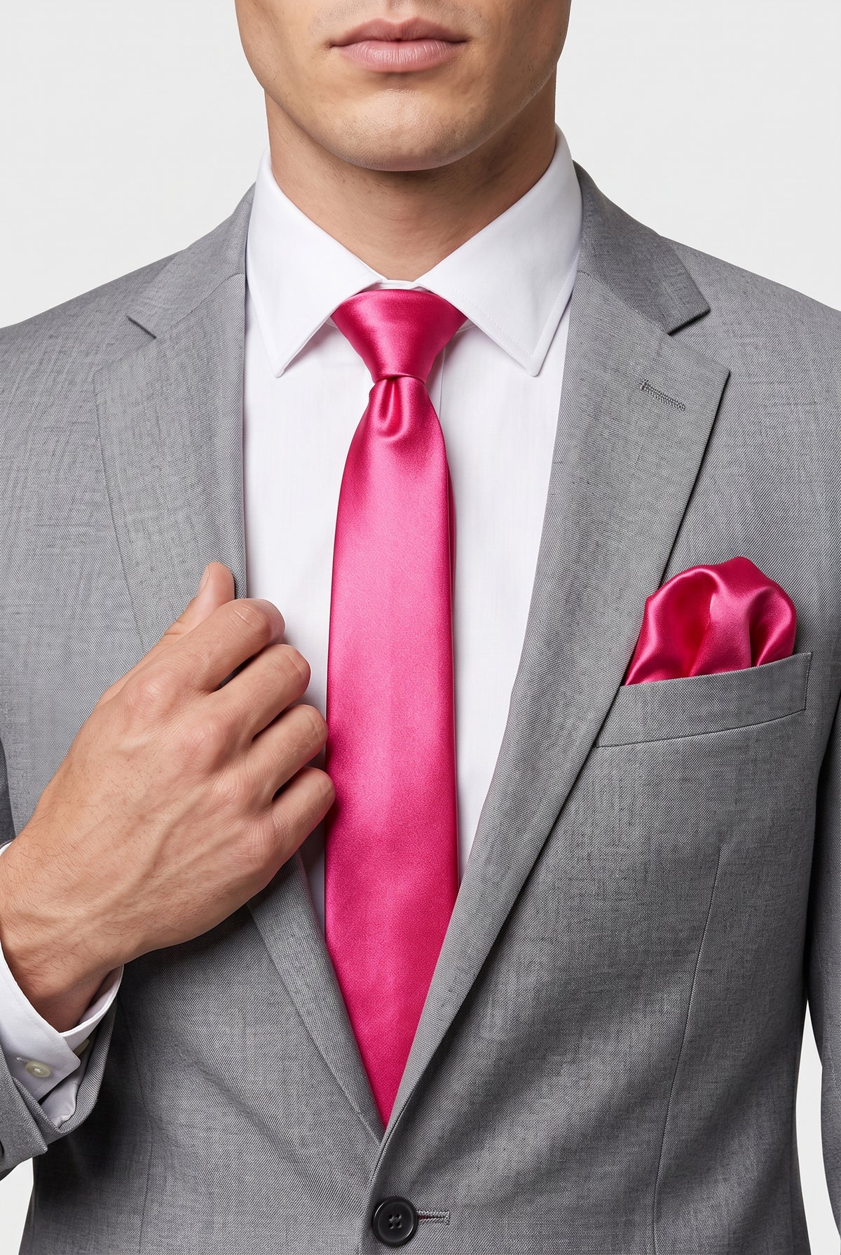 Fuchsia satin tie and pocket square styled with a grey suit
