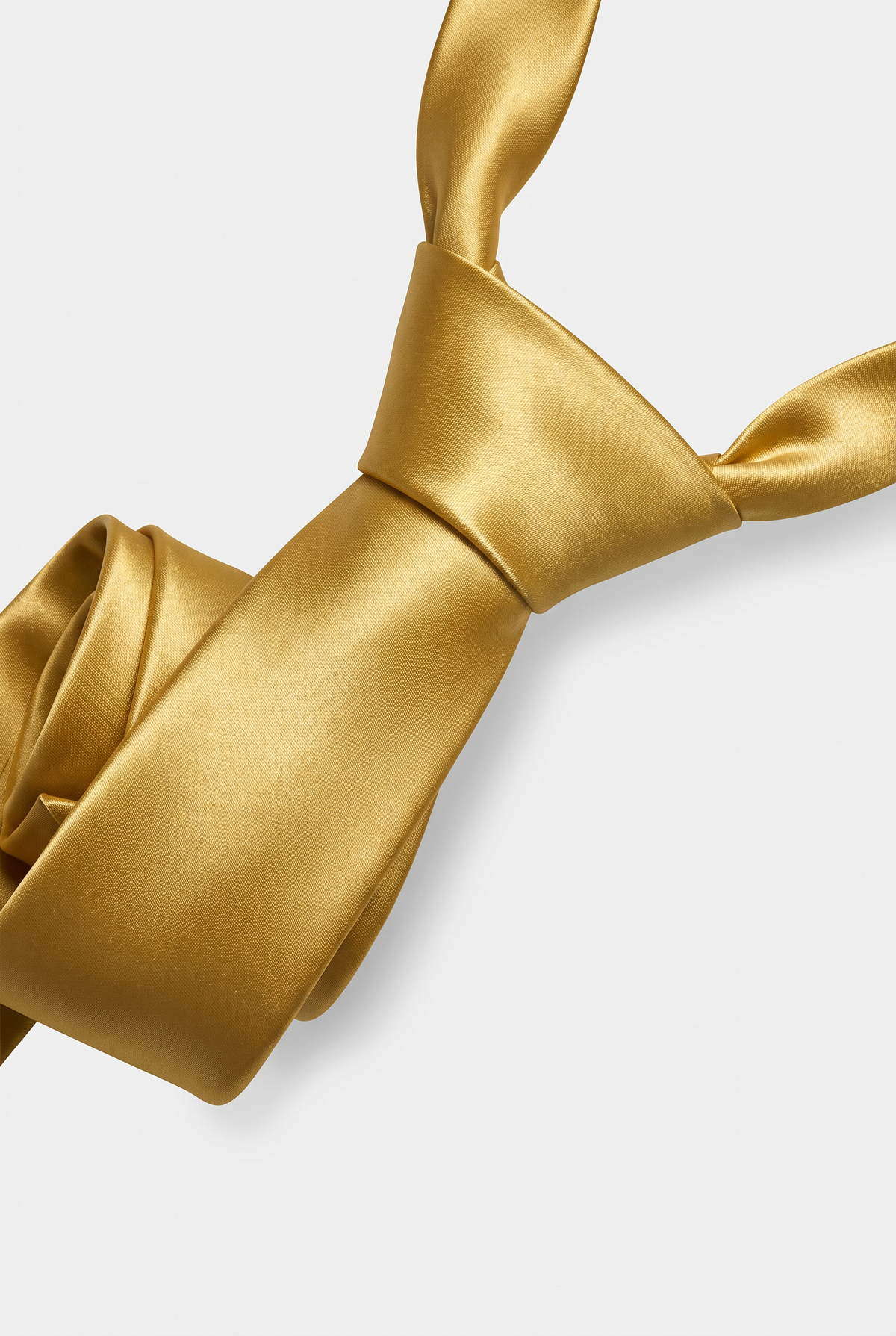 Gold satin necktie showing knot and fabric texture close-up