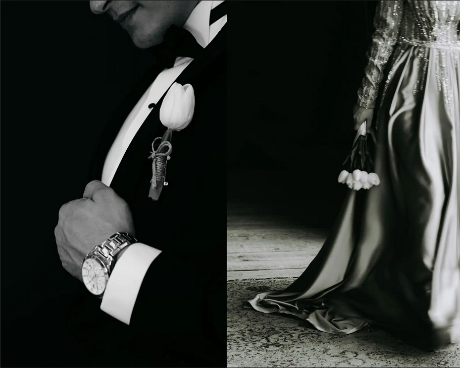  A man in a classic tuxedo stands beside a woman in an elegant gown, both exuding sophistication and style at a black-tie event