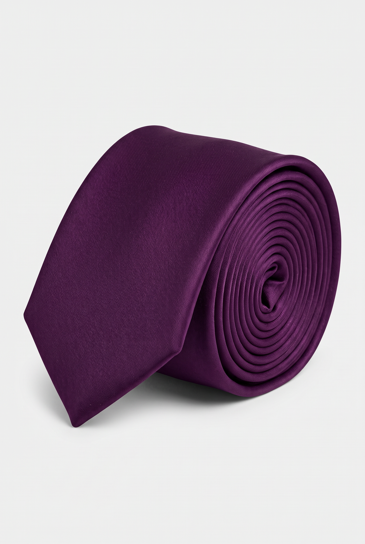 Purple satin men's necktie, rolled close-up view 