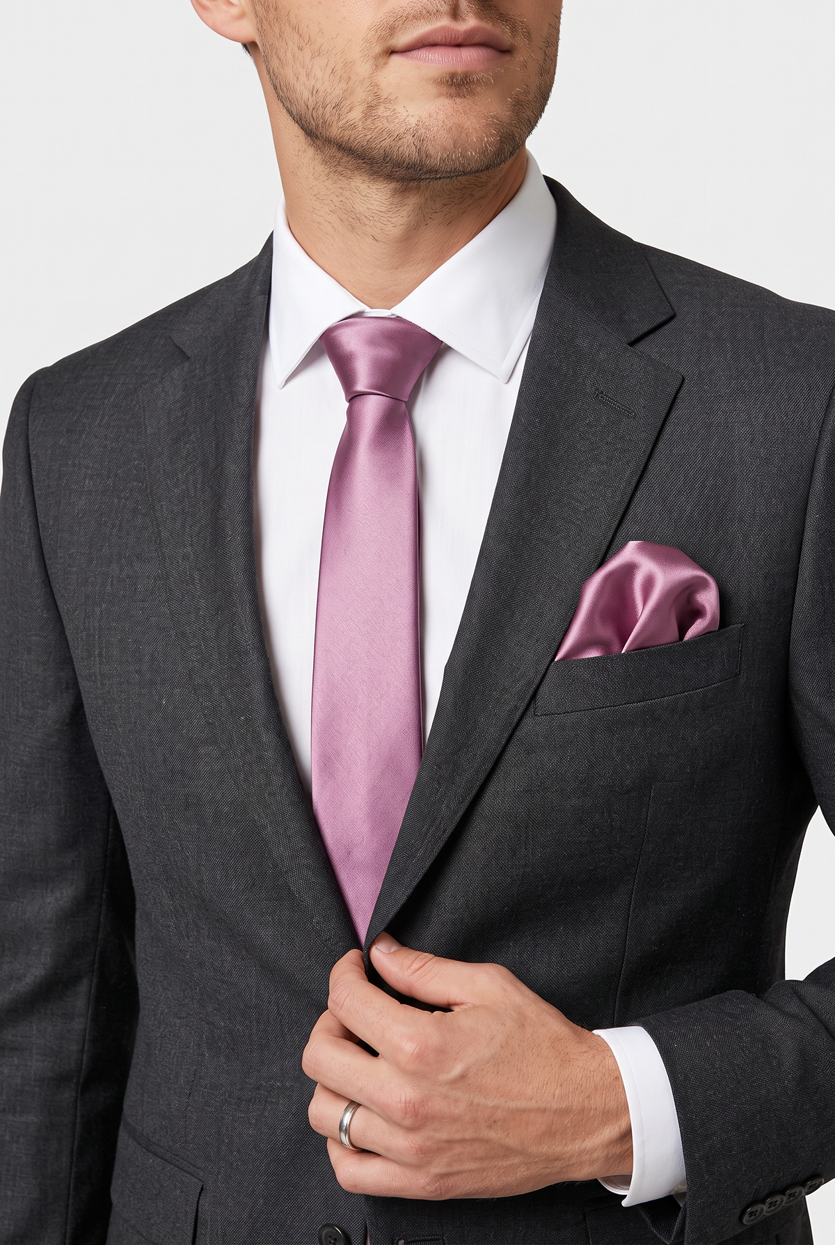 Violet satin tie and pocket square styled with a black suit