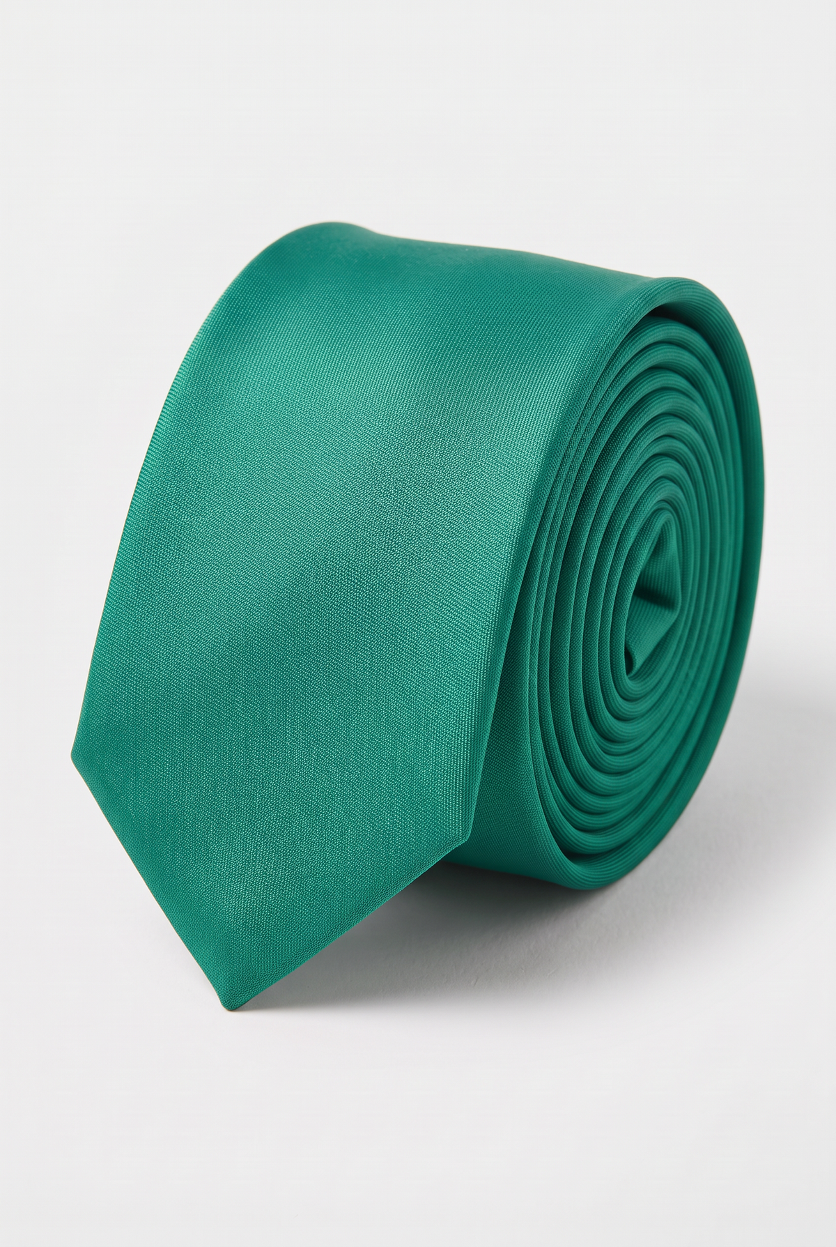Green satin men's necktie, rolled close-up view 