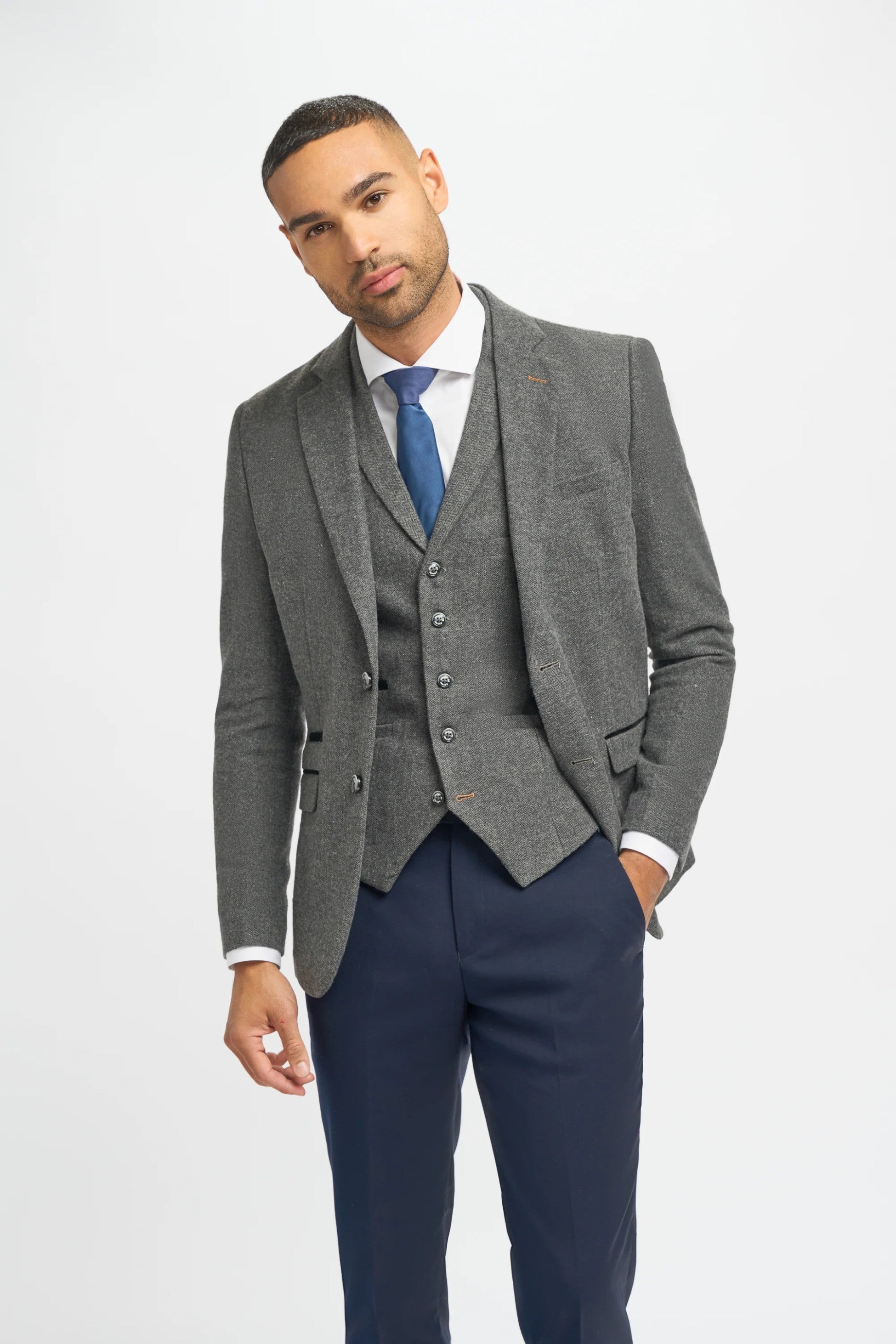 Men's Grey Herringbone Tweed Jacket and Waistcoat with Slim Fit Navy Blue Trousers - Grey - Navy Blue